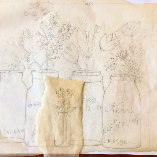 Old canning jars filled with spring flowers
