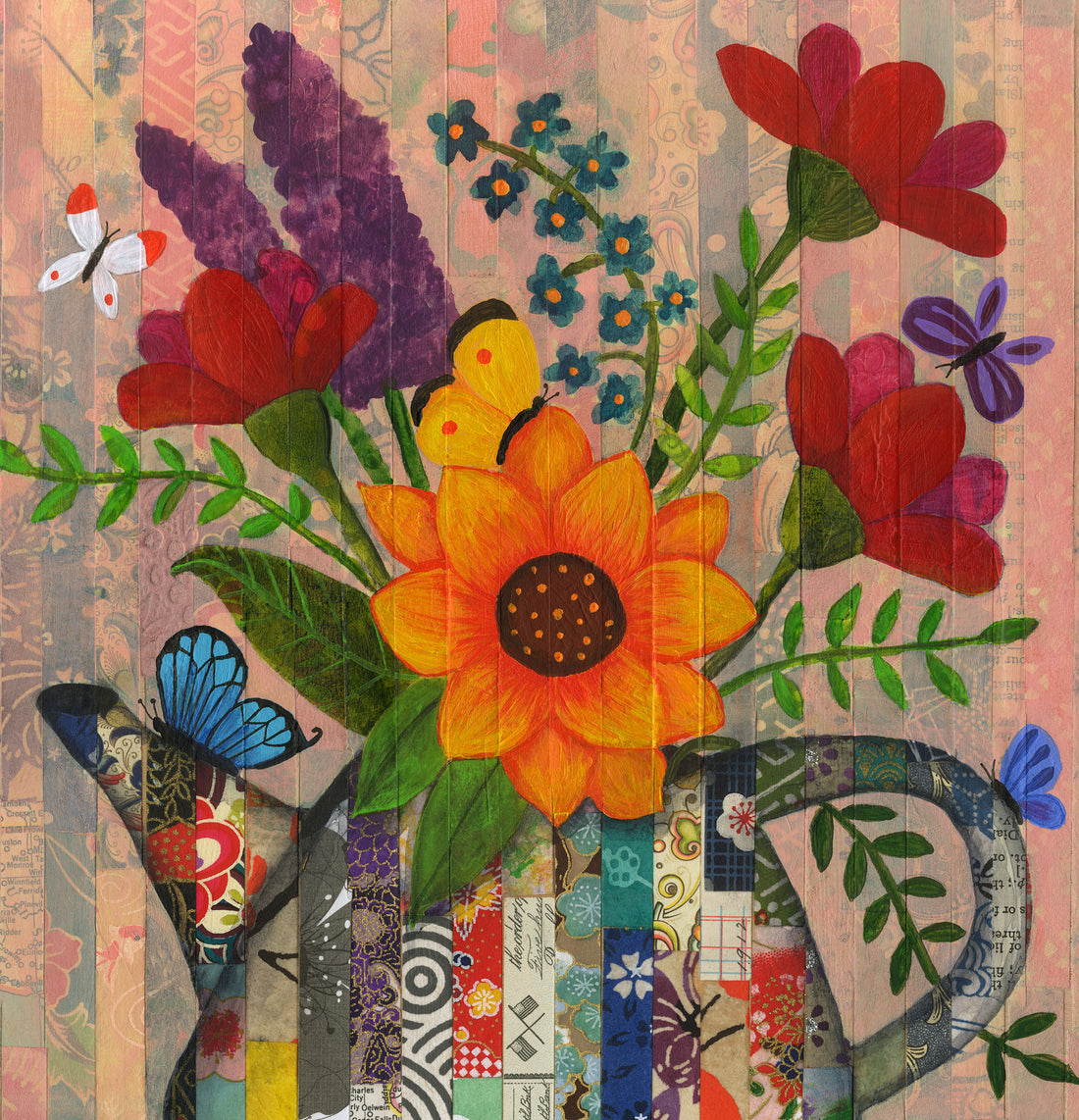 teapot filled with flowers